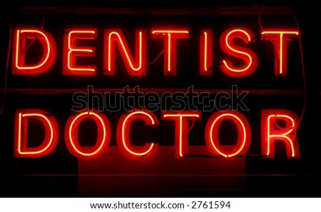 Dentist Doctor - Red Neon Light Advertising On A Black Background