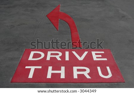 Drive Thru - White Text Written On A Red Background, Arrow Sign
