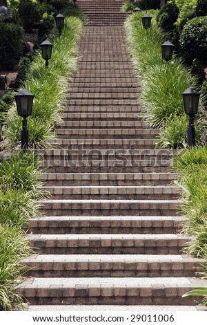 Long Outdoor Stone Steps In A Park Leading Up A Hill