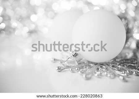 Silver and white christmas decoration on holiday background. Merry christmas card. Winter holidays. Xmas theme.