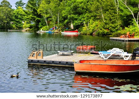 Beautiful lake with docks and diving platform in Ontario Canada cottage country