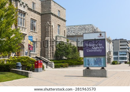KINGSTON, CANADA - AUGUST 2, 2014: Welcome sign on Queen\'s university campus next to Students Memorial Union building in Kingston, Ontario, Canada.
