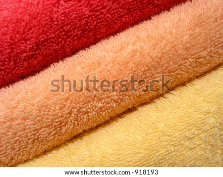 Stack of bright colorful clean towels close
