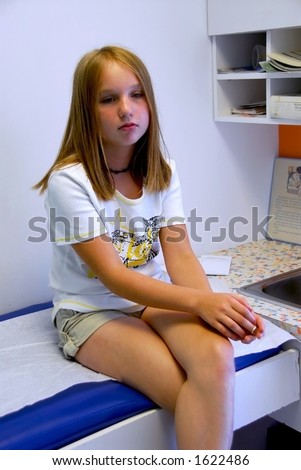 Young girl waiting in doctor\'s office