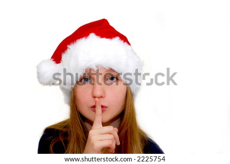 Portrait of a young girl wearing Santa\'s hat isolated on white background