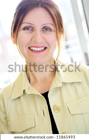 Portrait of a mature smiling business woman