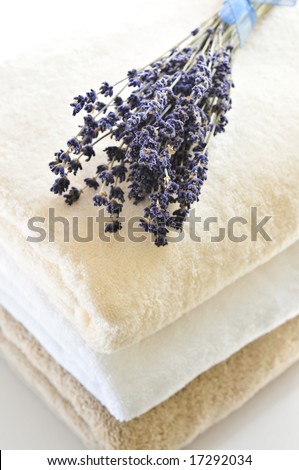 Stack of soft towels isolated on white background