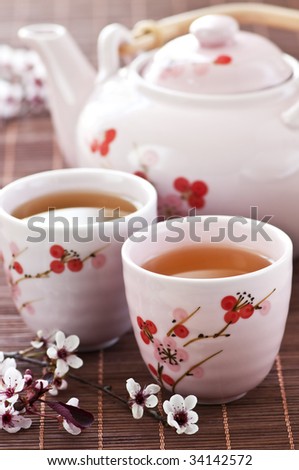 Green tea set with teapot and cups