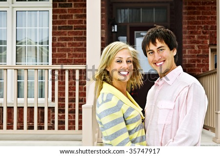 Young happy couple in love at home