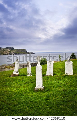 Graveyard near rocky Atlantic shore in Newfoundland, Canada