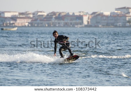 ILHAVO, PORTUGAL - JULY 21: Unidentified rider  during the wakeboard demo in the 3rd Kiteloop Contest Aveiro 2012 on july 21, 2012 in Ilhavo, Portugal.