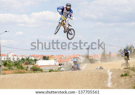 CASTELO BRANCO, PORTUGAL - MAY 5: Andre Duarte big jump at the 3rd stage of the Luso-Spanish BMX race Trophy the  on may 5, 2013 in Castelo Branco, Portugal.