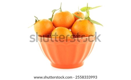 Similar – Foto Bild Orangefarbene Mandarinen in Keramik-Ornamentschale auf Holztisch