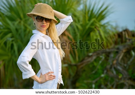 lovely blonde female in safari fashion at florida scrub nature preserve