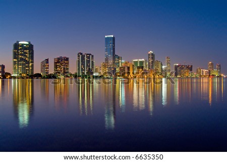 miami florida bayfront skyline at night (actual reflections in water)
