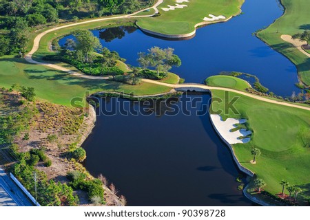 aerial view of nicely manicured florida golf green