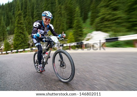ALMATY, KAZAKHSTAN - JULY 14: N.Tlegenov (No. 37) in action at  the sports event Up Hill 