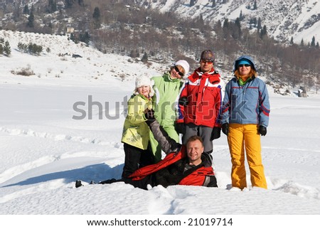 Friends in winter mountain