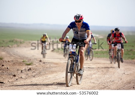 ALMATY, KAZAKHSTAN - MAY 2: J.Satkynaliev (N1)  in action at Adventure mountain bike marathon in desert \