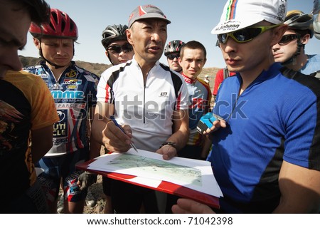 ALMATY, KAZAKHSTAN - MAY 2: Route briefing at Adventure mountain bike cross-country marathon in desert \