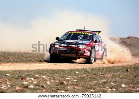 ALMATY, KAZAKHSTAN - APRIL 9: Danov and Revin (10) in action at auto competition \
