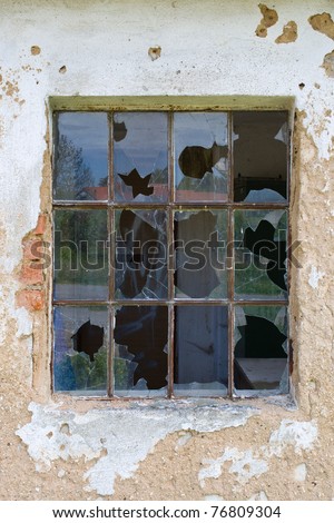 Broken window in a old deserted house