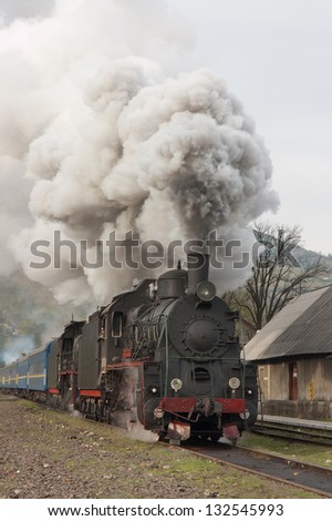 Steam train at a railway station