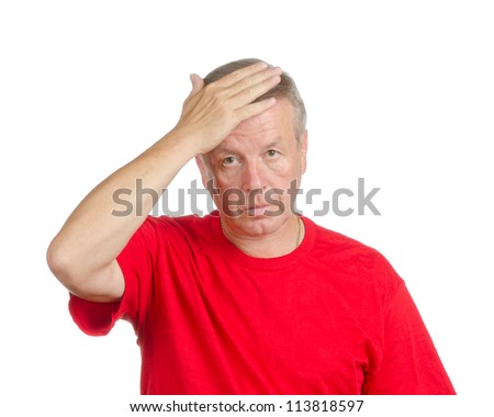 man smacking his forehead. Isolated on white. Body language. Disappointment. Self-accusation.