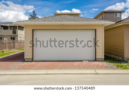 Fragment of a luxury house with a garage door in Vancouver, Canada.