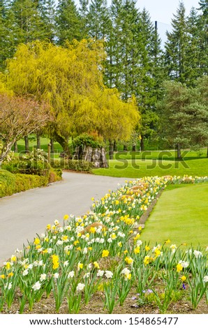 Golf course with gorgeous green and flowers.