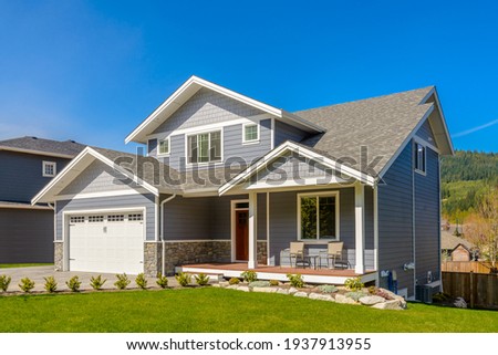 A perfect neighbourhood. Houses in suburb at Summer in the north America. Luxury houses with nice landscape. Stock foto © 