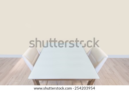 An empty dining table in empty room. Modern dining room in luxury house.