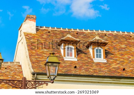 Nice mediterranean house facades roofs and windows with different colours