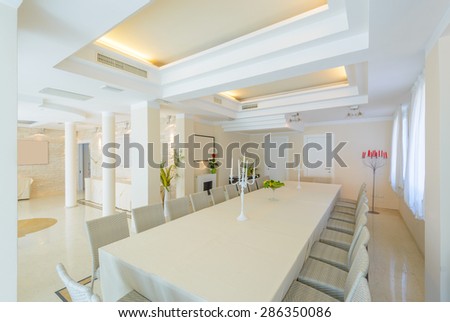 Large luxury dining room interior. New empty hotel or home space.