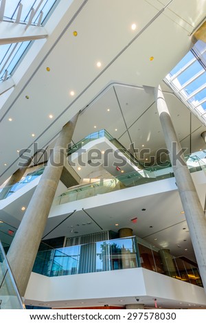 Abstract fragment of the architecture of modern lobby, hallway of the luxury hotel, shopping mall, business center in Vancouver, Canada. Interior design.