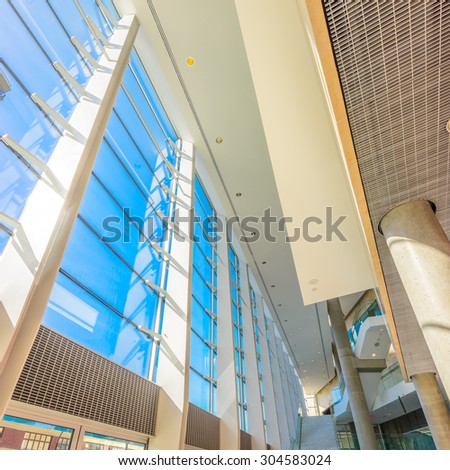 Abstract fragment of architecture of modern lobby, hallway of the luxury hotel, shopping mall, business center in Vancouver, Canada. Interior design.