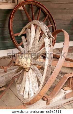 An old broken wagon wheel.