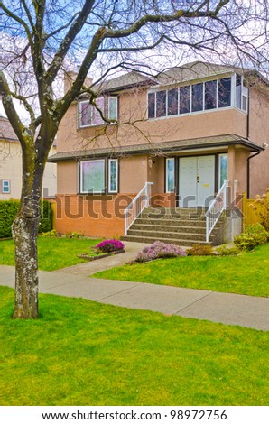 Affordable house with rich green in Vancouver, Canada.