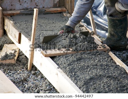 Levelling concrete footings for the foundation of a house under construction
