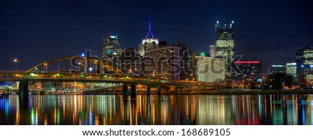 A panorama of downtown Pittsburgh, Pennsylvania at night from the North Shore.