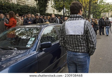 LONDON, UK NOVEMBER 2014: Romanian citizens stand in line in street to vote in the second round of presidential elections on 16 November 2014 at the ICR London, UK