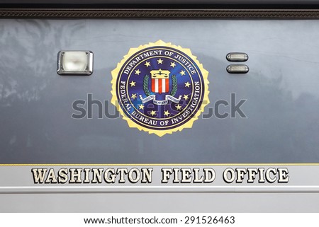 WASHINGTON, DC - JUNE 5: FBI seal on a Mobile Command Center parked in front of the Federal Bureau of Investigation Washington Field Office in Washington, DC on June 5, 2015.