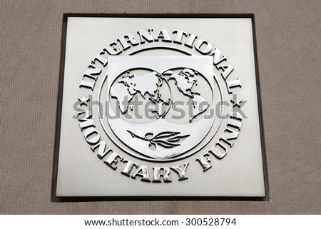WASHINGTON, DC - JULY  17: Plaque outside the International Monetary Fund (IMF) in Washington, DC on July 17, 2015.