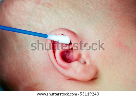 One week Old Baby's Ear with cleaner