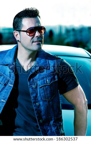 Young man with sunglasses in the city.Urban style