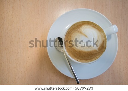 Representation of a heart with cappuccino cream