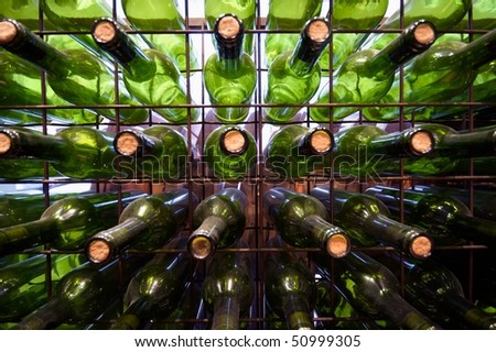 Partial view of a bottle full of empty bottles