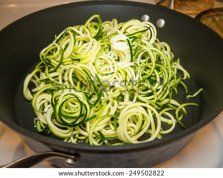 Similar – Image, Stock Photo Zucchini raw vegan pasta with assorted vegetables. Vegan food