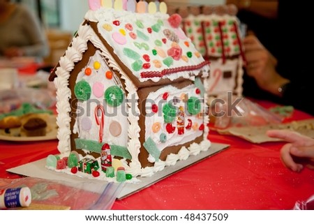 Gingerbread dough is used to build gingerbread houses similar to the \