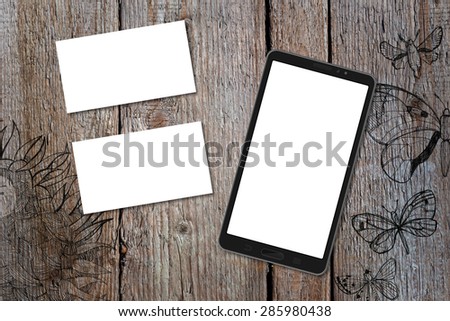 Horizontal business card and smart phone (16:9 screen) mockup with wood deck background. Card is 50x90mm. Wood deck have doodle pictures with sunflowers and butterflies.